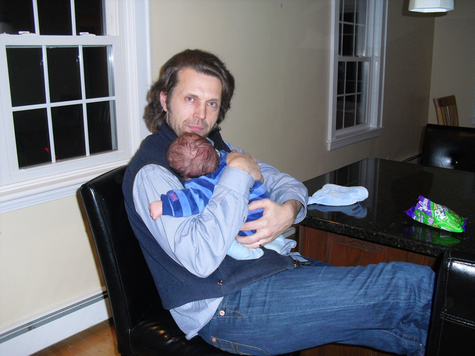 Long hair dude with his little son.